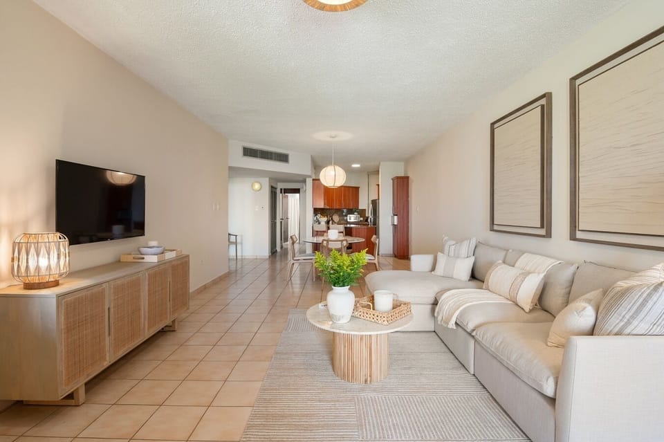Apartment, Balcony | Living area | 32-inch flat-screen TV with digital channels