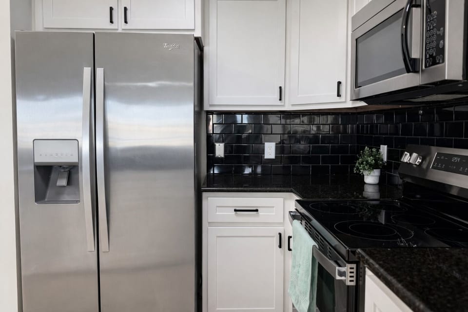 Fully equipped kitchen with stainless steel appliances