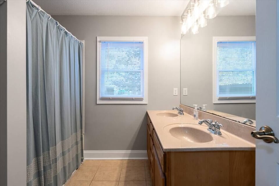 Full bathroom with tub