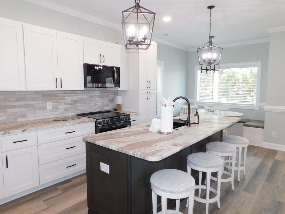 Modern kitchen with spacious island and cozy breakfast nook
