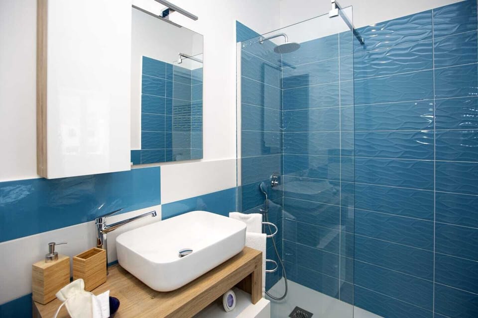 Standard Double Room | Bathroom | Shower, hair dryer, towels, soap
