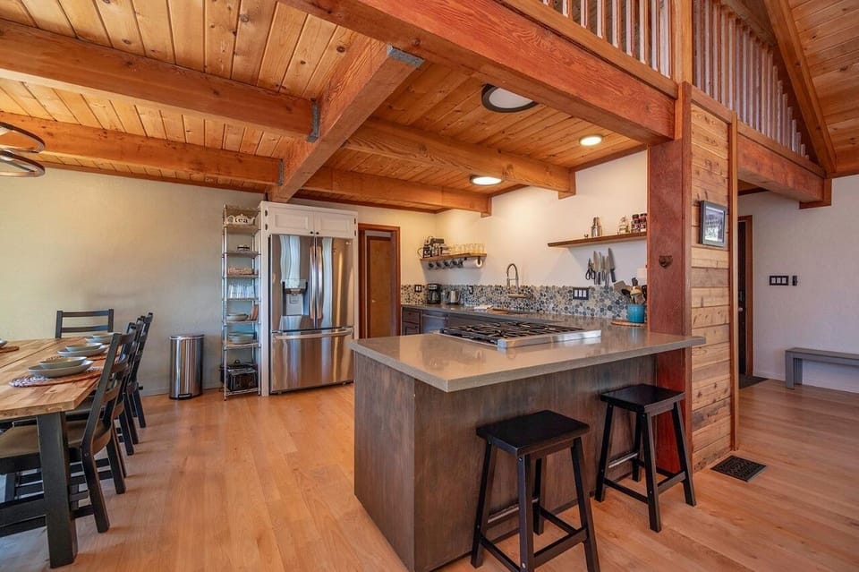 Fully stocked kitchen with high-end appliances and conveniences