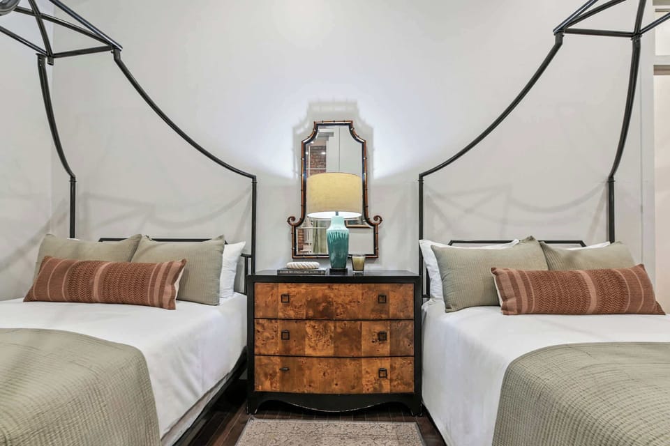 Bedroom 2 | Two Full Beds | First Floor | Ensuite to Bathroom 2