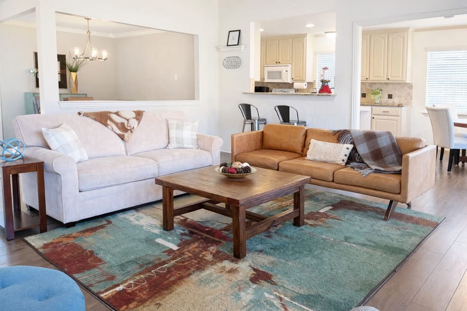 Two spacious sofas (beige sofa is a double sleeper)
