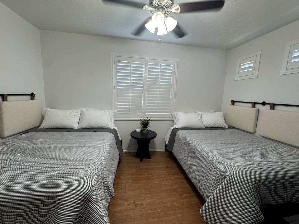 Bedroom 4- Two double beds with Smart TV