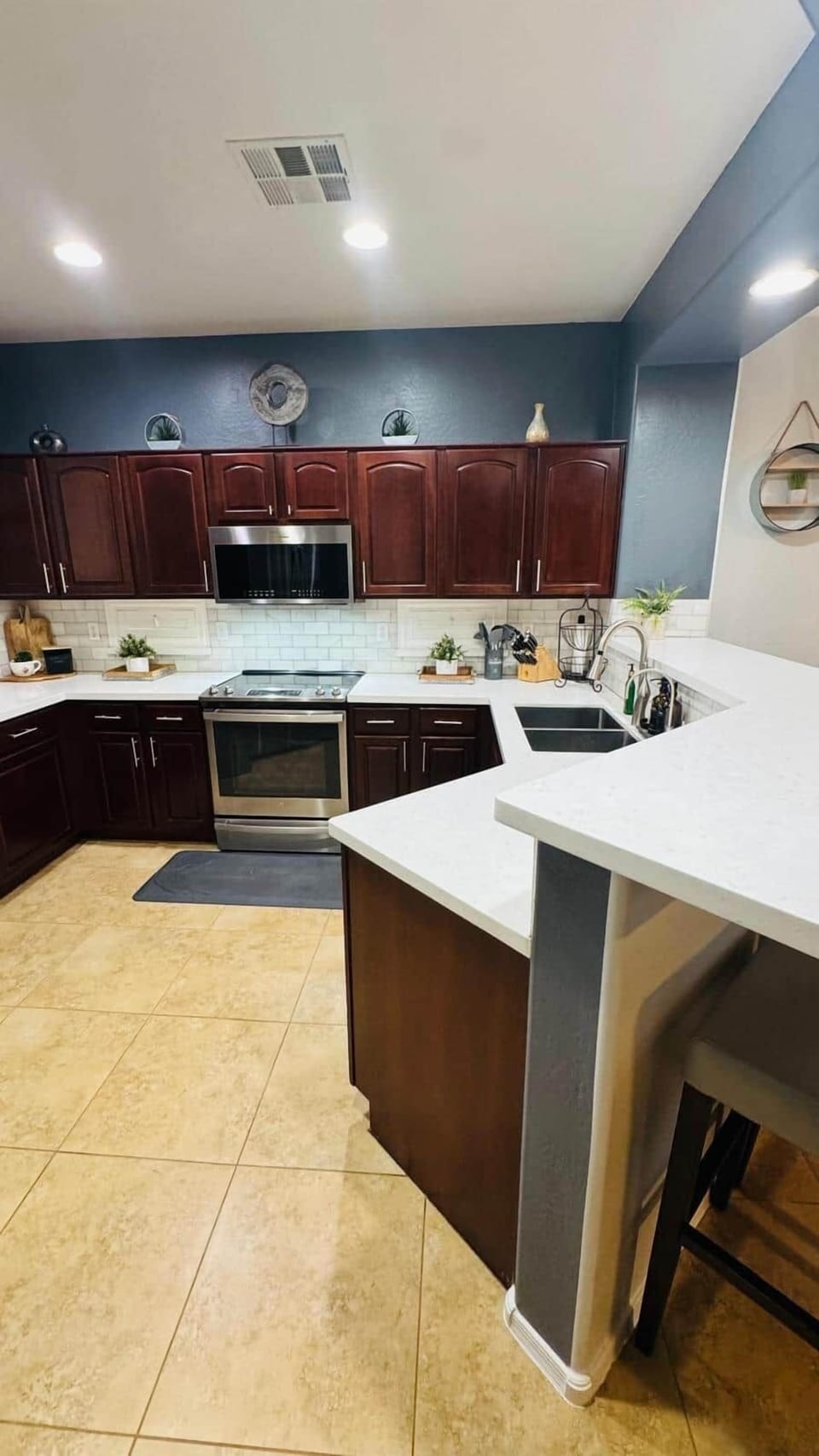 Fully stocked kitchen with Fridge, Stove, Microwave