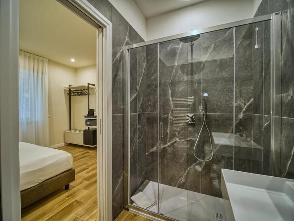 Hair dryer, bathrobes, bidet, towels