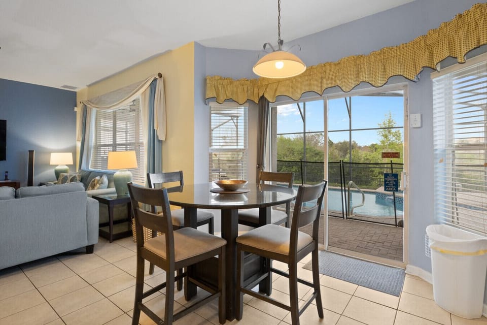 Bright dining space with sliding doors to the outdoor patio