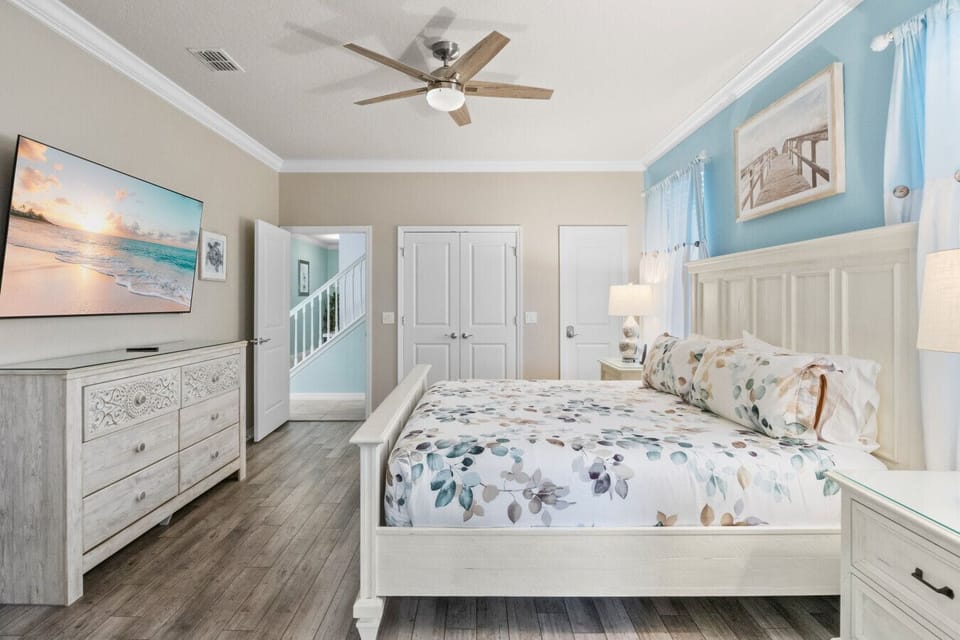 Spacious queen bedroom with dresser