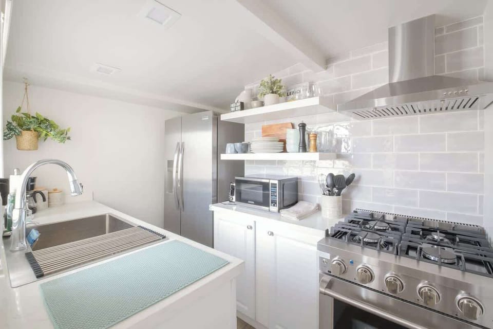 The brand new, gourmet kitchen comes fully equipped for your stay