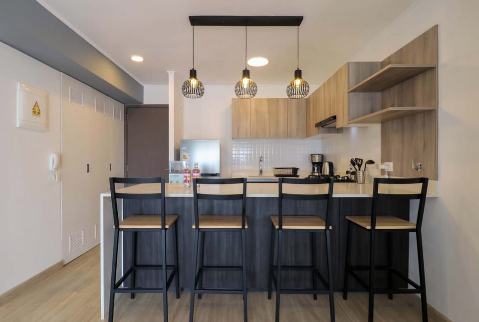 Modern space with kitchen and elegant bar