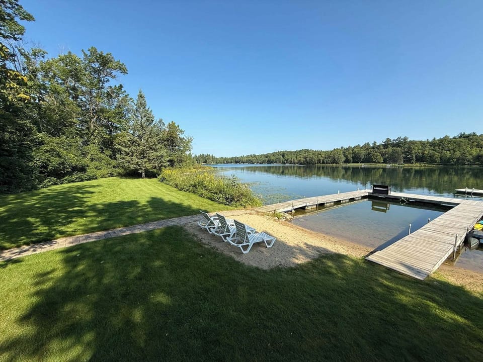 Level lot with a gentle slope into the crystal clear water is great for kids!  