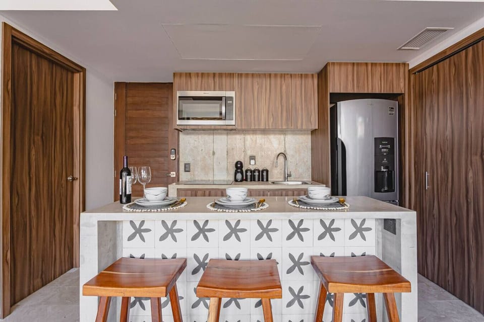 Enjoy home-cooked meals and memorable moments with a fully equipped kitchen and inviting breakfast bar.