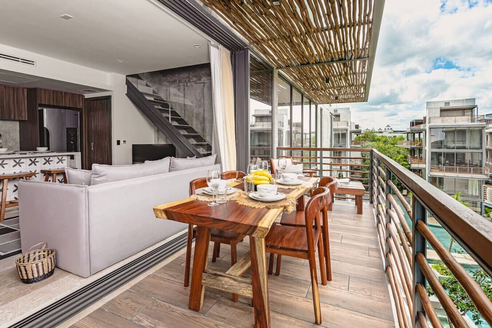 Savor meals, morning coffee, and tropical views from your spacious outdoor retreat.