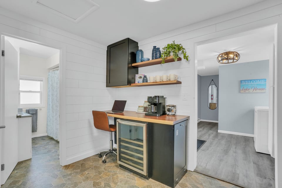 Wine fridge, computer nook, and coffee station