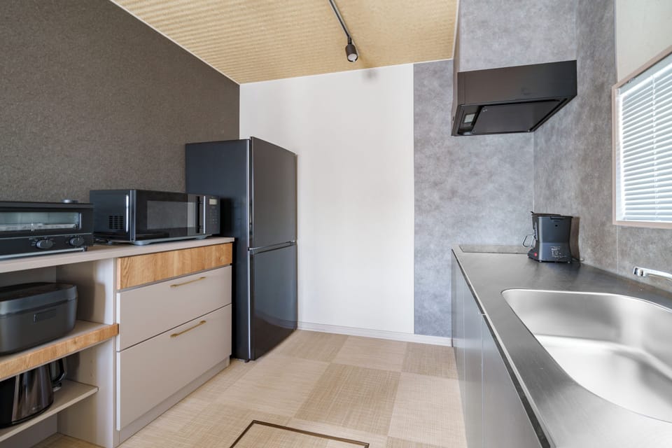 Apartment | Private kitchen | Fridge, microwave, stovetop, rice cooker