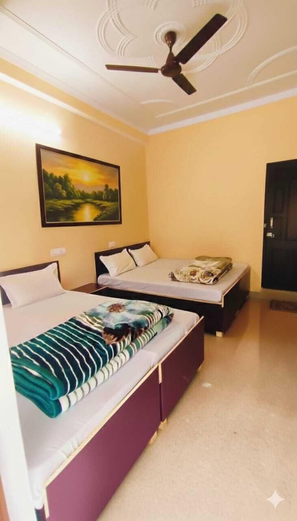 Basic Quadruple Room, Balcony, Mountain View | Bathroom | Shower, free toiletries, slippers, towels