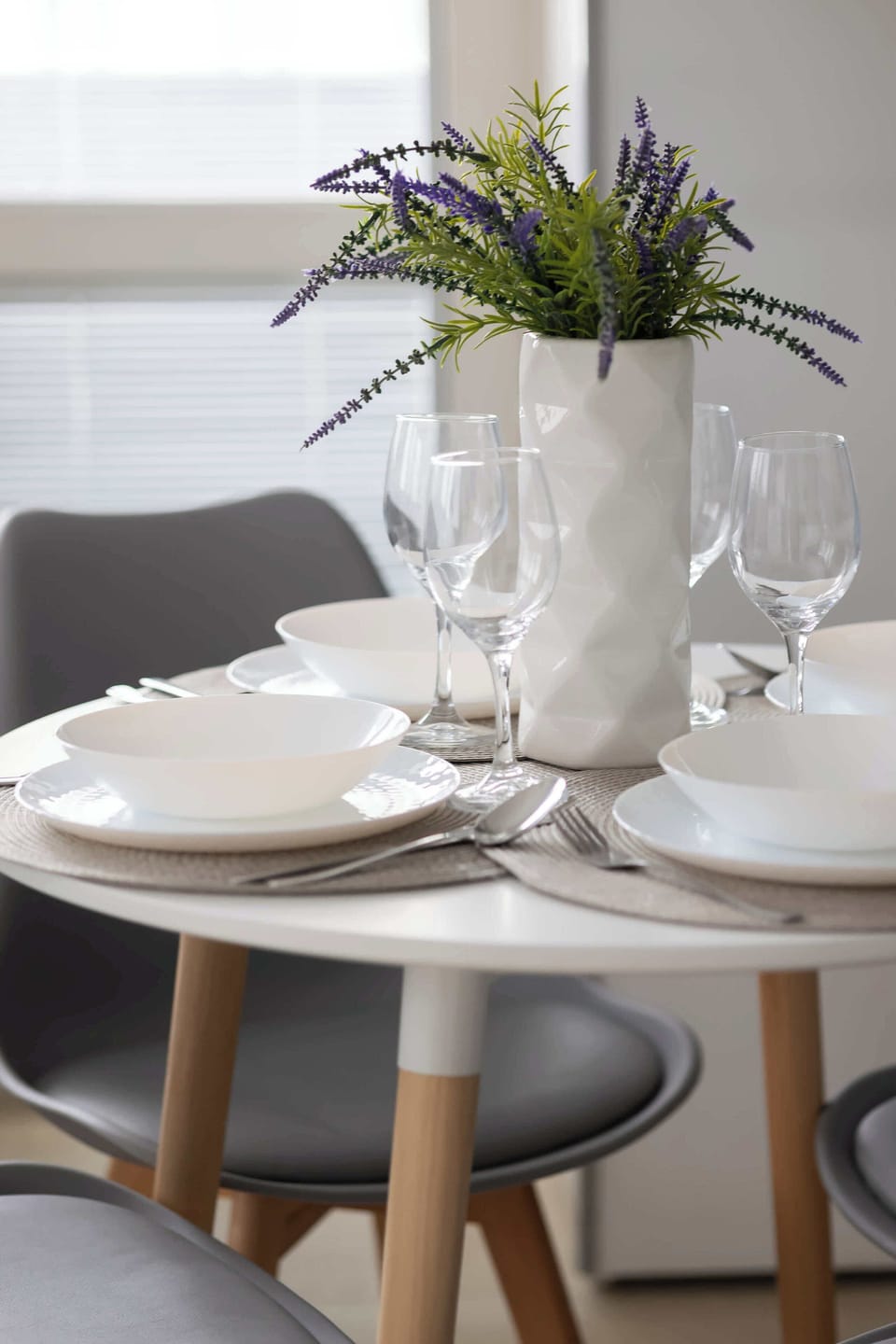 Close-up of a dining table with elegant tableware.
