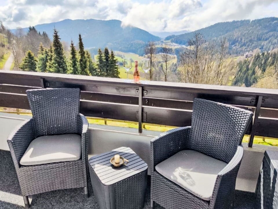 Furniture, Outdoor Furniture, Chair, Balcony, Outdoor Table, Mountain Range, Shade, Armrest, Porch, Coffee Table