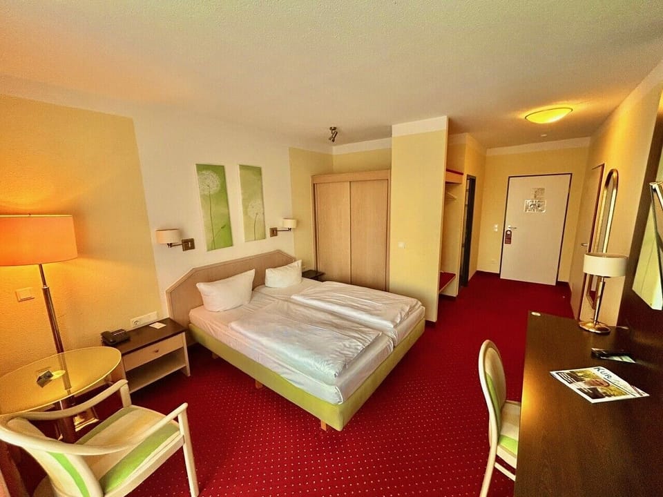 Double Room, Balcony, City View | Minibar, in-room safe, desk, free WiFi