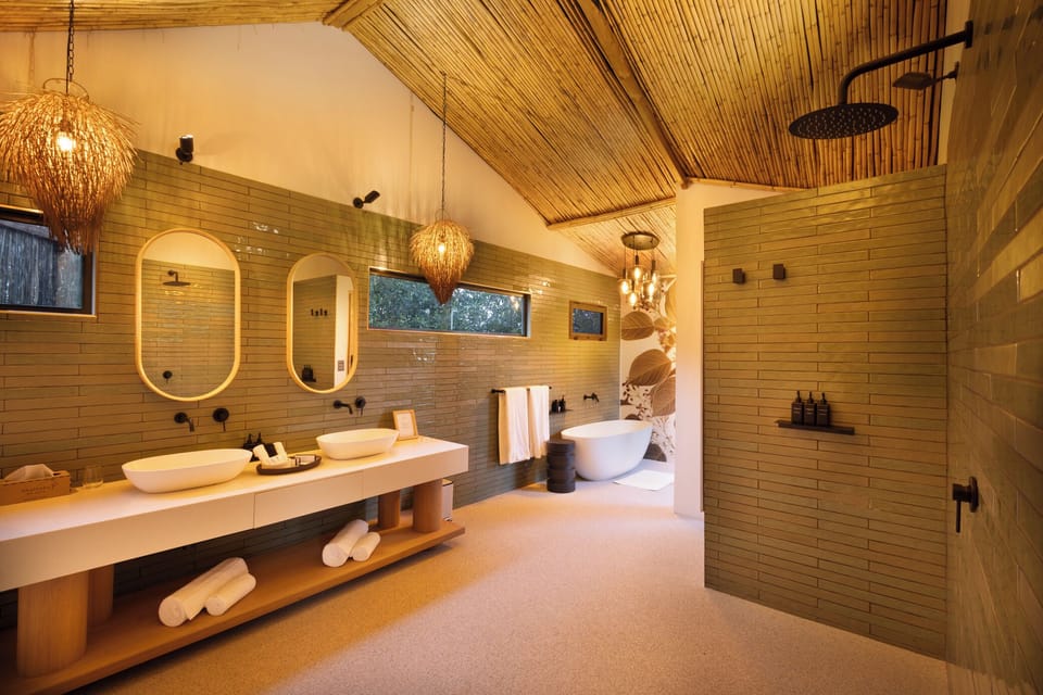 Luxury Suite, Private Pool, Park View | Bathroom | Separate tub and shower, rainfall showerhead, designer toiletries