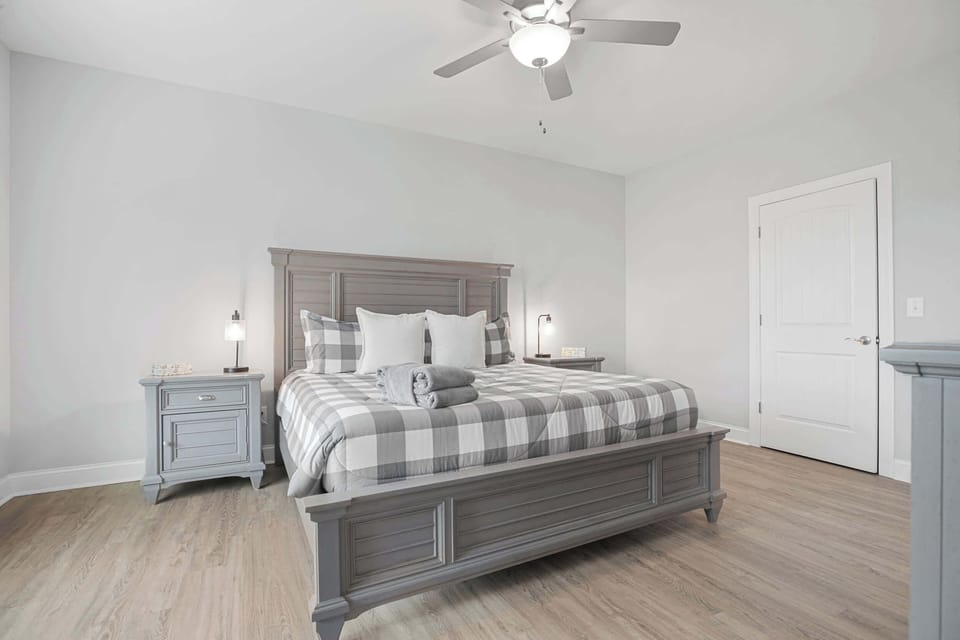 Modern bedroom with a king-size bed and matching nightstands