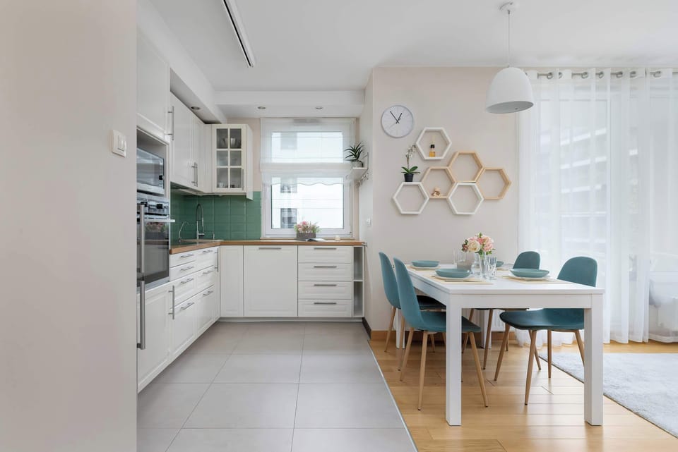 Cook and dine in style with the modern kitchenette and dining area.