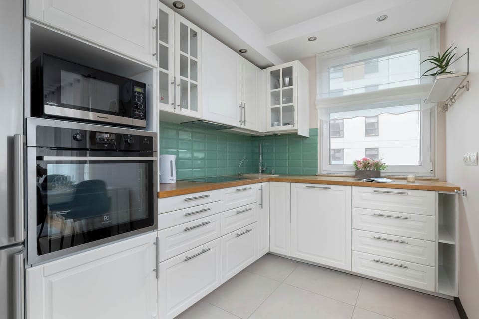 The fully equipped kitchenette includes everything you need for a home-cooked meal.