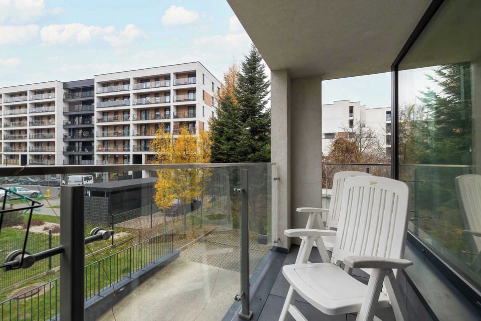 The balcony provides a perfect spot for enjoying the fresh air.