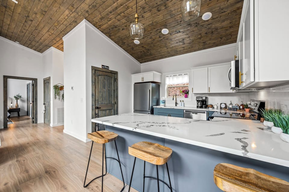 Cook up a quick snack or a breakfast bowl to serve it on the breakfast bar style seating with room for 3.