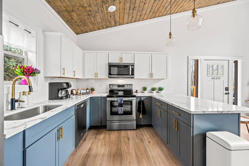 Time for some food? Head to the fully stocked luxury kitchen, with stainless steel appliances such as the oven, stove, microwave, coffee maker and dishwasher all at your disposal