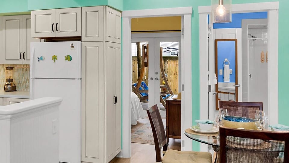 Your bright kitchen flows seamlessly into cozy dining and bedroom areas, creating the perfect space for cooking, eating, and relaxing together.