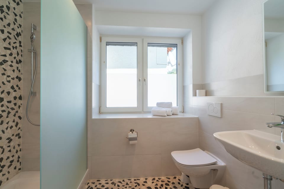 Double Room, Garden View | Bathroom | Shower, hair dryer, towels, soap