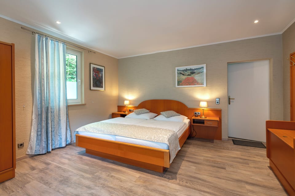 Double Room, Garden View | Desk, iron/ironing board, free WiFi