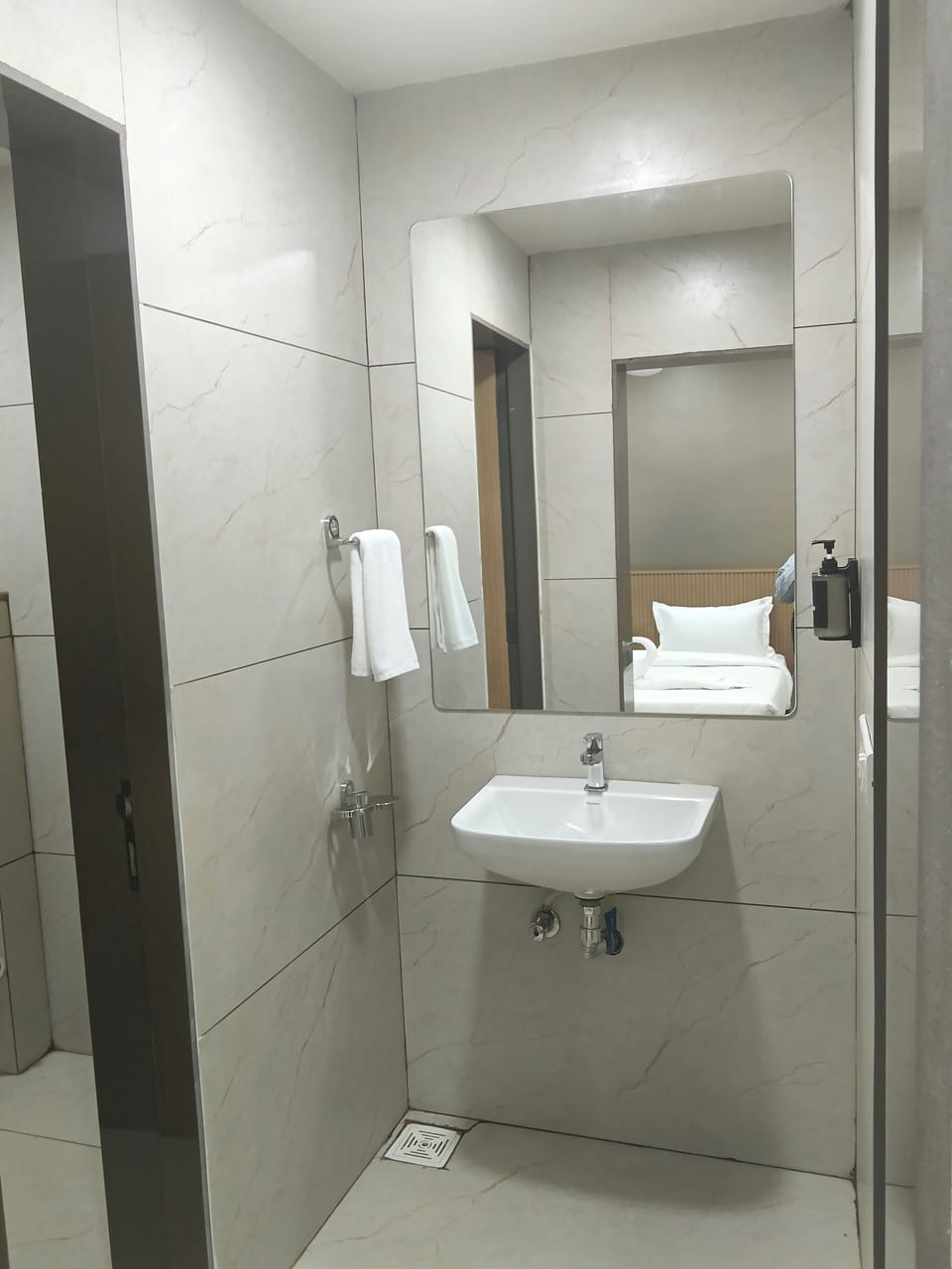 Shower, towels, soap, toilet paper
