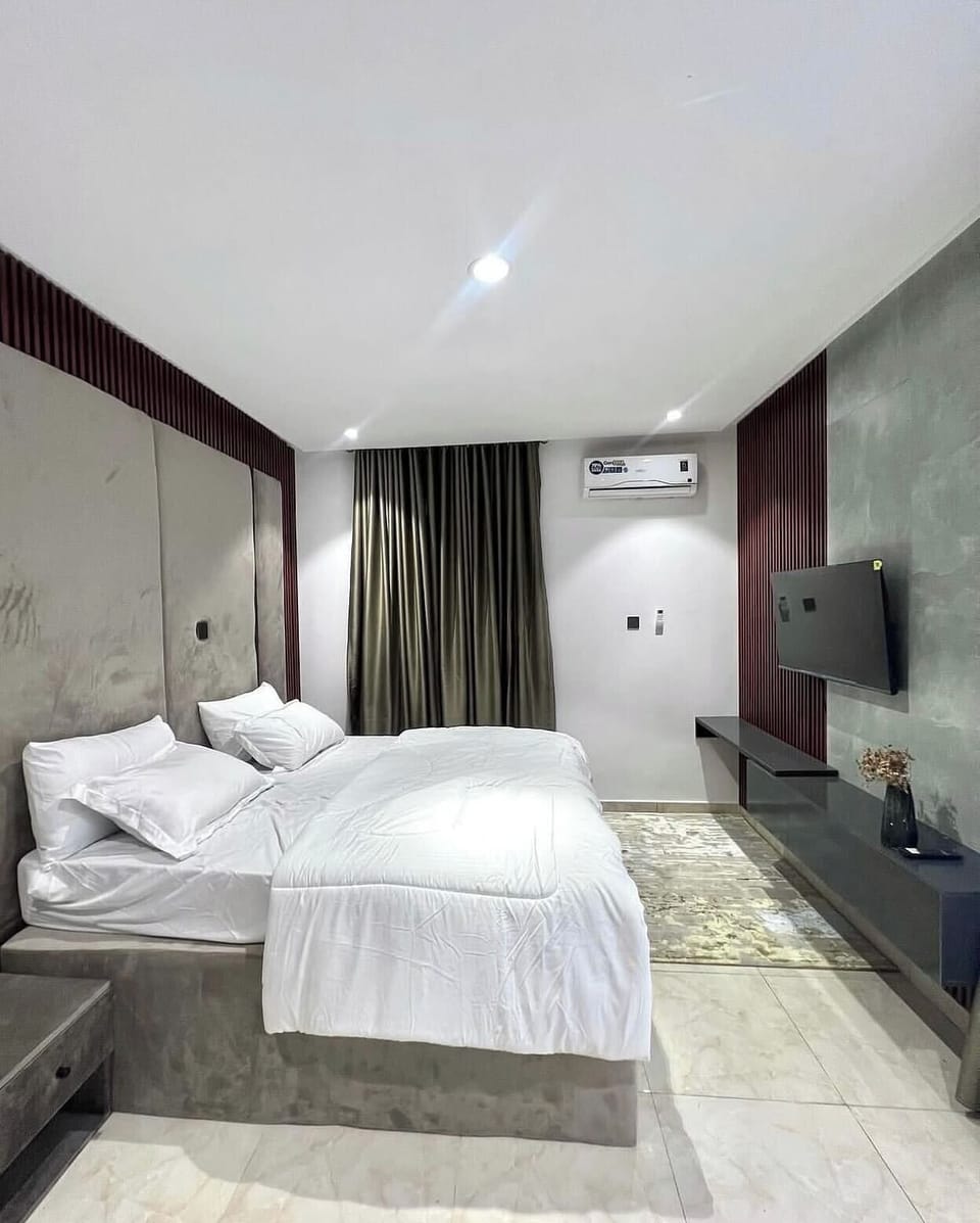 Economy Apartment, Balcony, City View | Desk, laptop workspace, blackout drapes, soundproofing