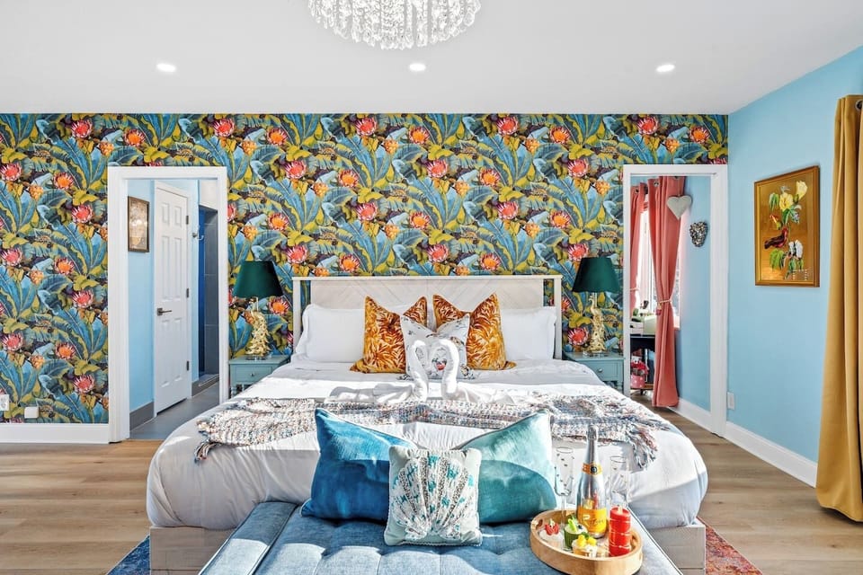 Spacious primary suite with a king bed, designed for restful nights and relaxed mornings during your Fort Lauderdale waterfront escape.