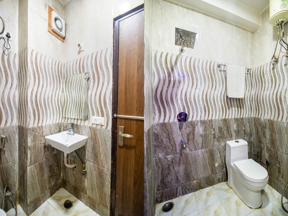 Shower, slippers, towels, soap