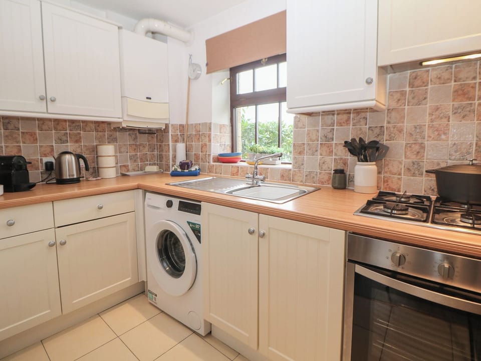 Fridge, microwave, toaster, cookware/dishes/utensils
