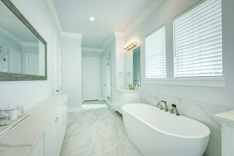 Soaking tub and walk in shower in the primary bathroom