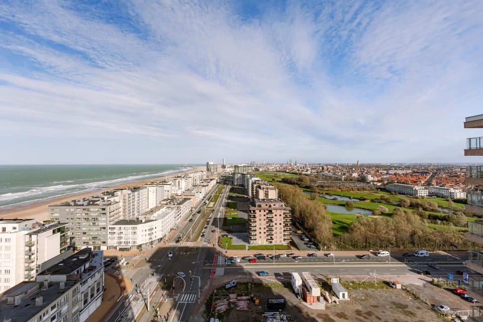 Sea to the left. City below. Golf course ahead. Floor 16 delivers.