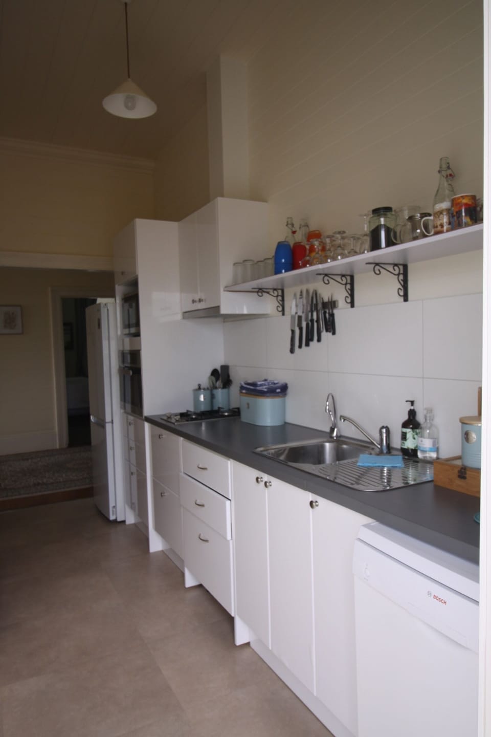 Coffee/tea maker, full-size fridge, shared microwave, electric kettle