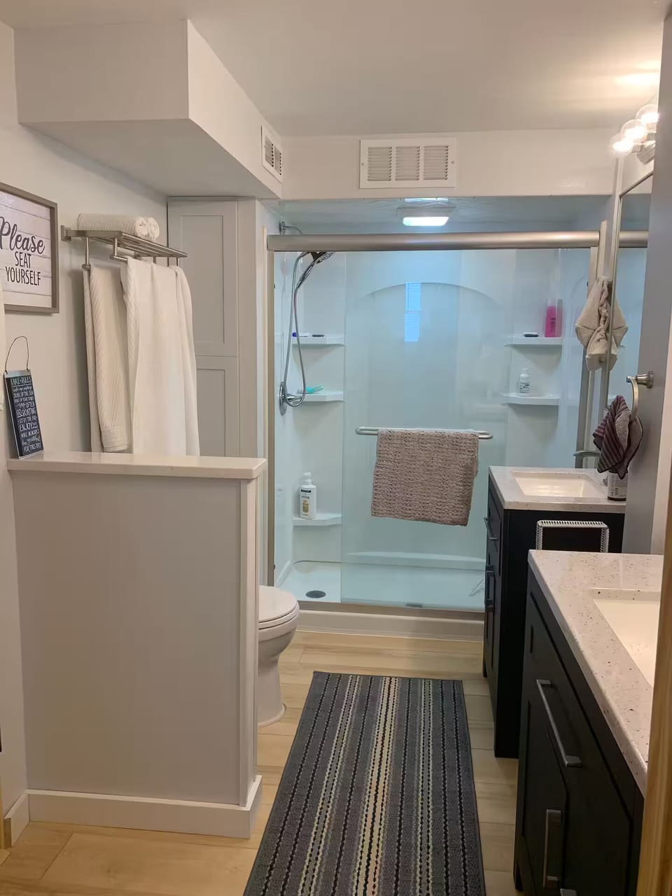 Bathroom with 2 sinks and a detachable showerhead to help with the kiddos.