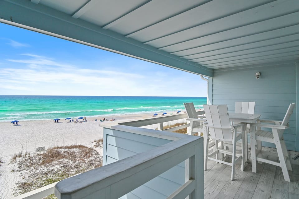 Large, covered patio off of the main living room on the second floor - great for morning coffee or a cold afternoon beverage. Come and Relax at SeaWinds 8!