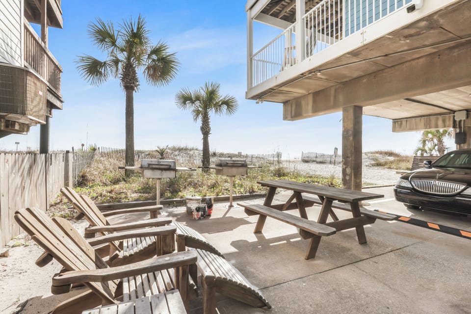 Shared BBQ and outdoor eating area beachside