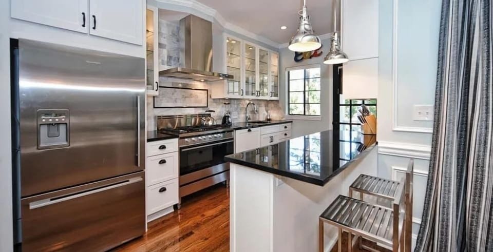 A full-size refrigerator and plenty of counter space make grocery shopping a breeze.
