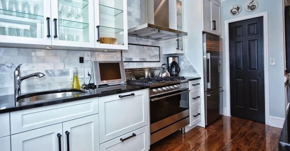 Modern appliances and sleek countertops make preparing your favorite meals an absolute breeze.