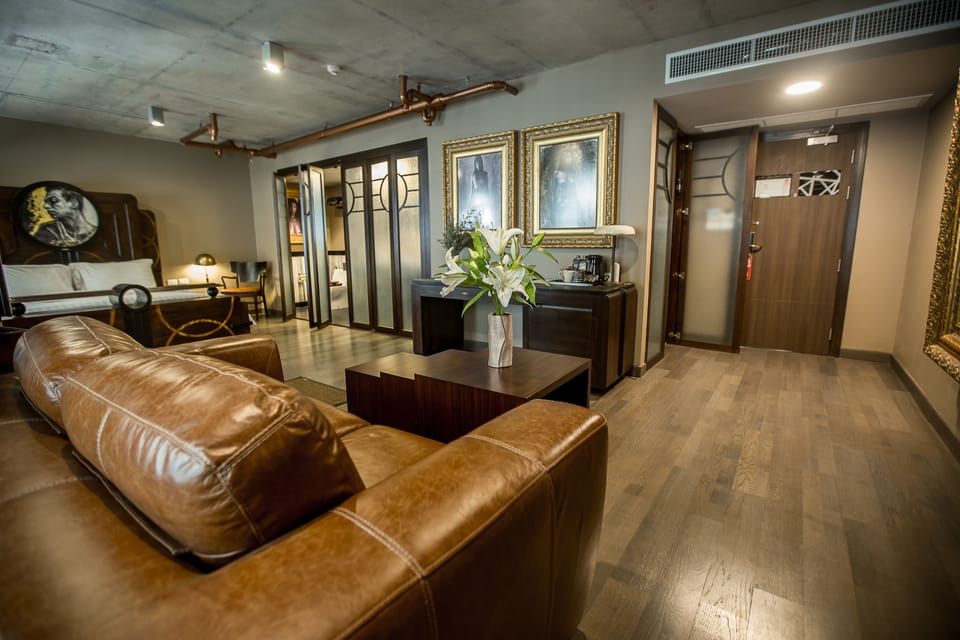 President Artist Signature Suite  | Living area | 42-inch LED TV with cable channels