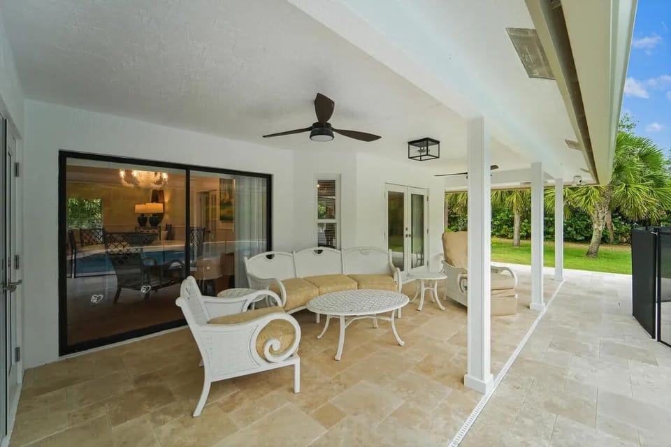 Cover patio with outdoor seating and TV