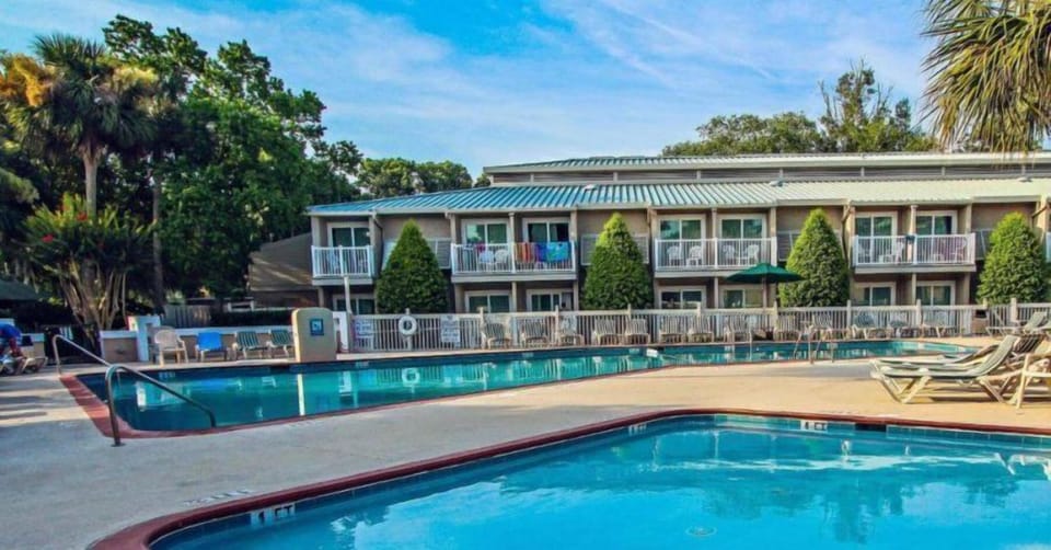 Take a refreshing dip in sparkling pools surrounded by lush landscapes for the ultimate getaway experience!